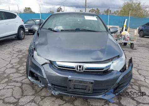 2013 Honda Insight Ex z USA, uszkodzony, nr VIN JHMZE2H70DS002121